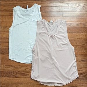 Two Fabletics athletic tank tops